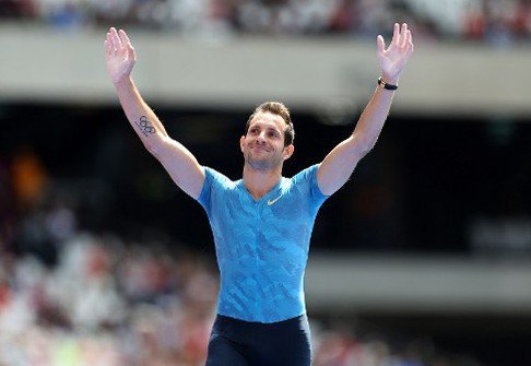 France's Renaud Lavillenie celebrates winning the Men's Pole Vault at the IAAF Diamond League Anniversary Games athletics meeting at the Queen Elizabeth Olympic Park stadium in Stratford, east London on July 25, 2015 . Photo Steven Paston / BPI / DPPI