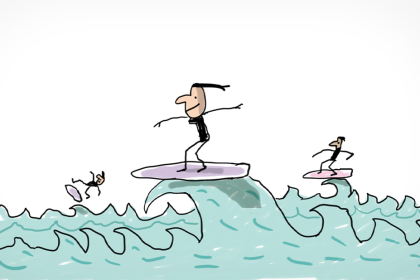 Une femme fait du surf sur une grosse vague.