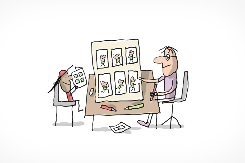 Assis à une table et se faisant face: un enfant lit une BD et un dessinateur de BD nous montre la planche de BD qu'il vient de dessiner.