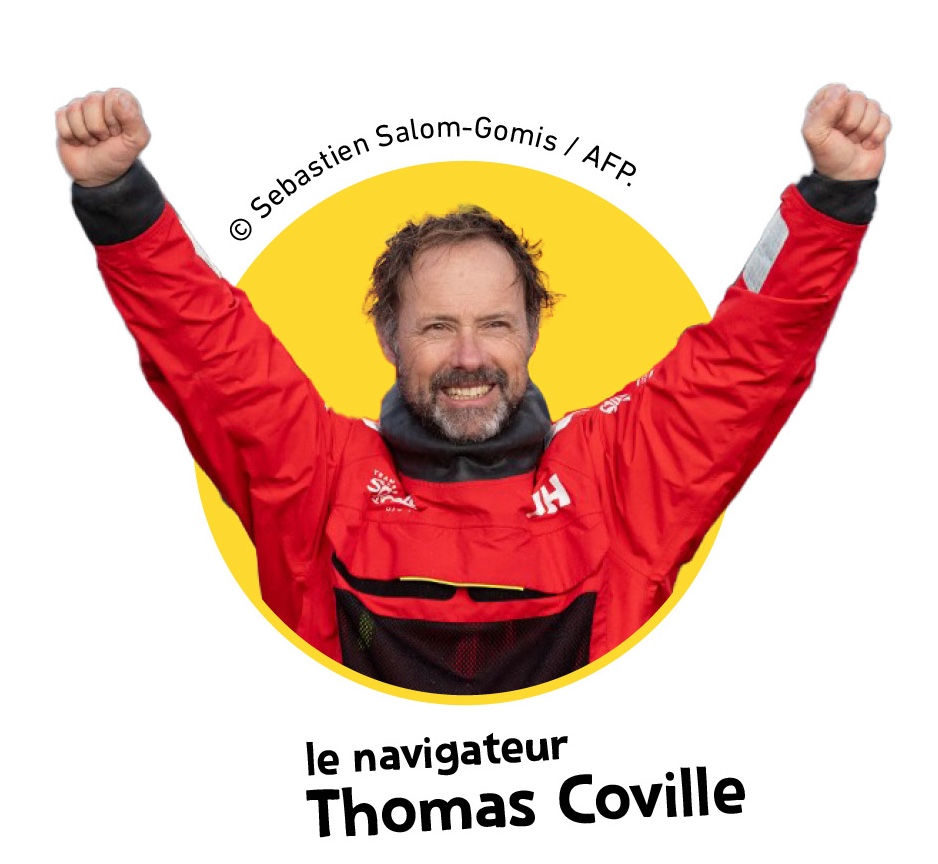 Thomas les bras levés et tout souriant après son record.